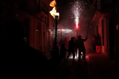 Correfoc parties, typical with firecrackers and lights in the towns