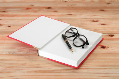 High angle view of book on table