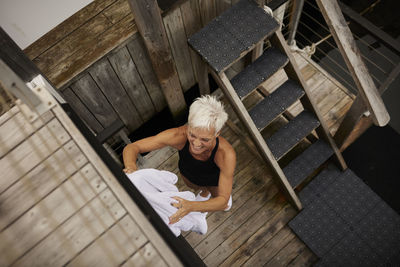 Senior woman preparing for swim