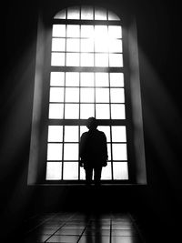 Silhouette people standing against white background