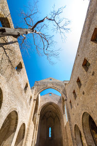 Low angle view of historic building against sky