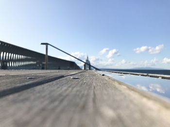 Surface level of bridge against sky