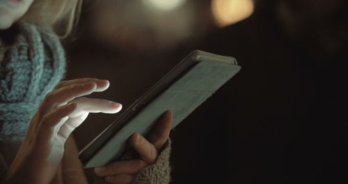 Close-up of hand using mobile phone