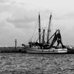 Ship in sea against sky