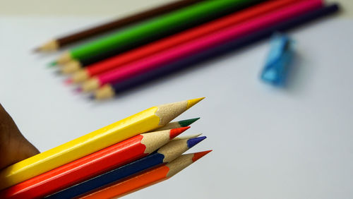 High angle view of colored pencils on table