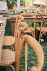 Close-up of empty chairs and table