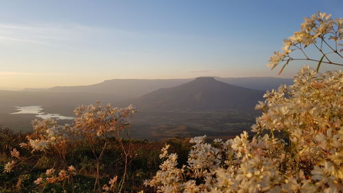 Scenic view of mountains against sky during sunset