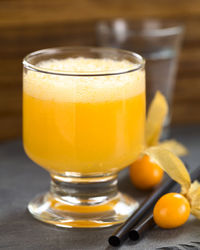 Close-up of juice in glass on table