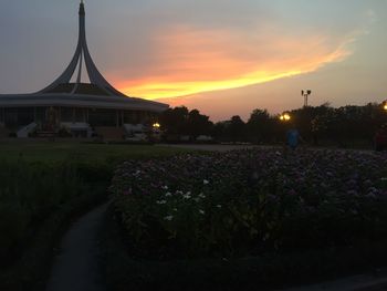 View of illuminated city at sunset