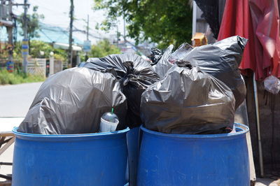 Close-up of garbage bin in city