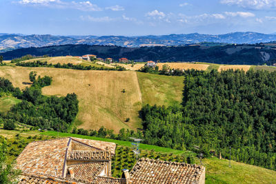 Scenic view of landscape and mountains against sky