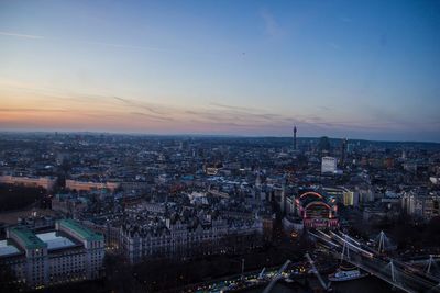 High angle view of city at sunset