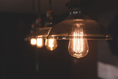 Close-up of illuminated light bulb