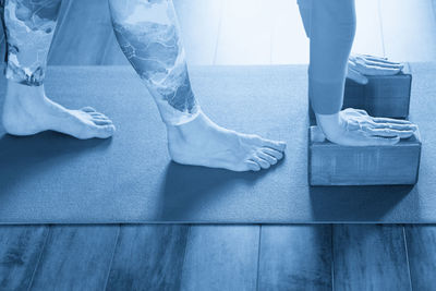 Low section of woman standing on floor