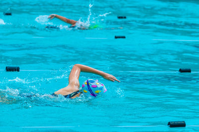 High angle view of man swimming in pool