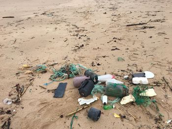 Garbage on sand at beach