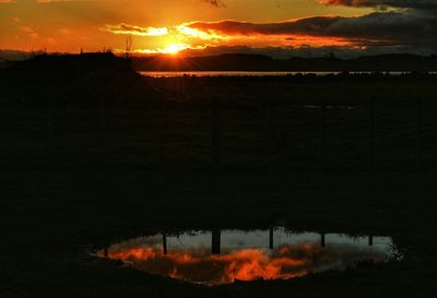 Scenic view of sunset over sea