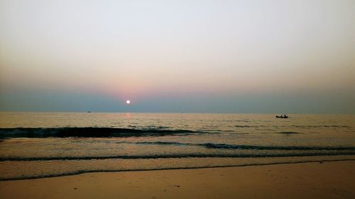 Scenic view of beach during sunset