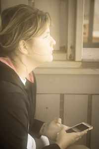 Woman sitting in a room