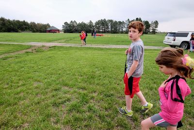 Students walking on playing field