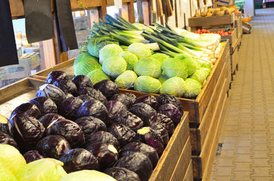 Various fruits in crate at market stall