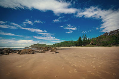 View of sandy beach against sky