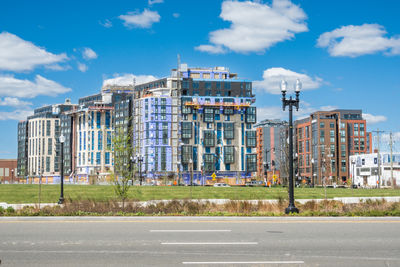 Buildings in city against sky