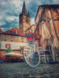 Bicycles against sky