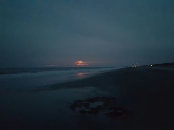 Scenic view of sea against sky at sunset
