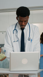 Portrait of doctor working at clinic