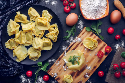 Preparation of italian pasta with ingredients. gastronomic concept