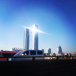 City skyline against blue sky