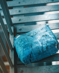 Close-up of blue metal railing