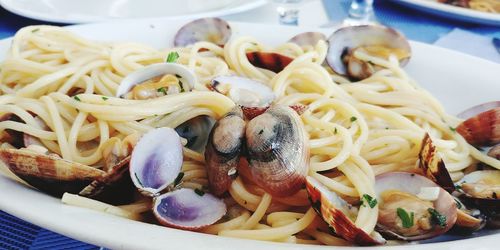 Close-up of seafood with noodles served in plate