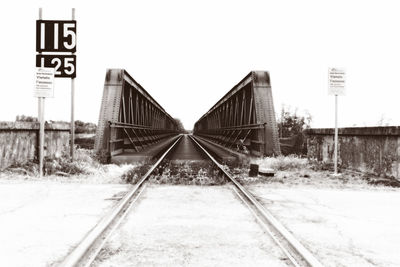 View of railroad tracks against clear sky