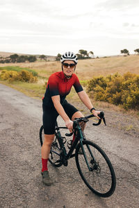 Full length of woman on bicycle