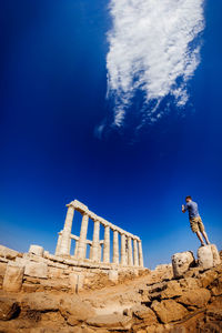 Low angle view of built structure against blue sky