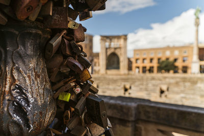 Close-up of padlocks hanging on building