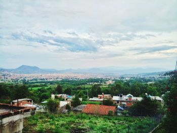 High angle view of houses against sky