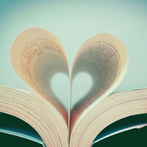 Close-up of heart shape on book