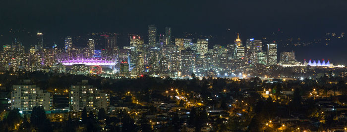 Vancouver skyline at night with city lights