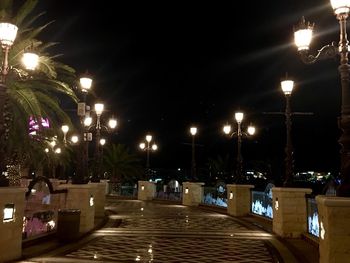 Illuminated street lights at night