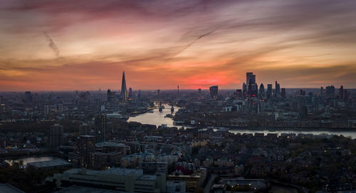 Cityscape against sky during sunset