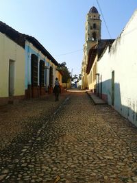 Narrow alley along buildings