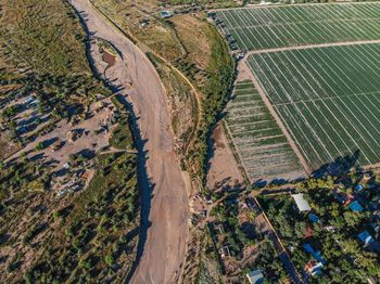 High angle view of agricultural field, farm, river, dry