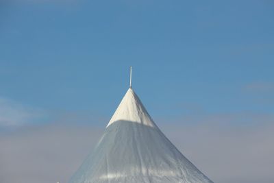 Low angle view of building against blue sky