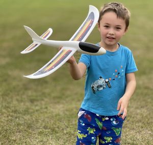 Boy standing on field