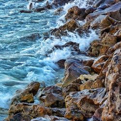 Waves splashing on rocks