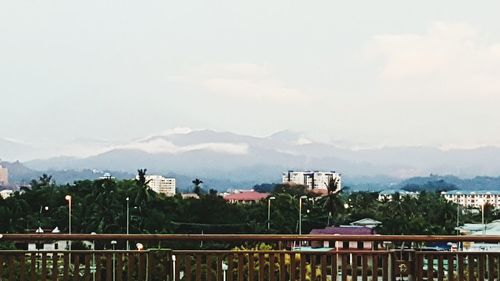 Scenic view of city against sky