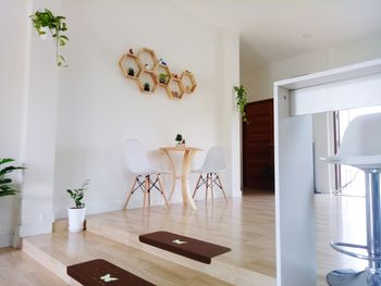 Empty chairs and table at home